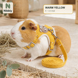 Warm Sun Yellow Nibbly small-pet vest harness and lead worn by a relaxed guinea pig