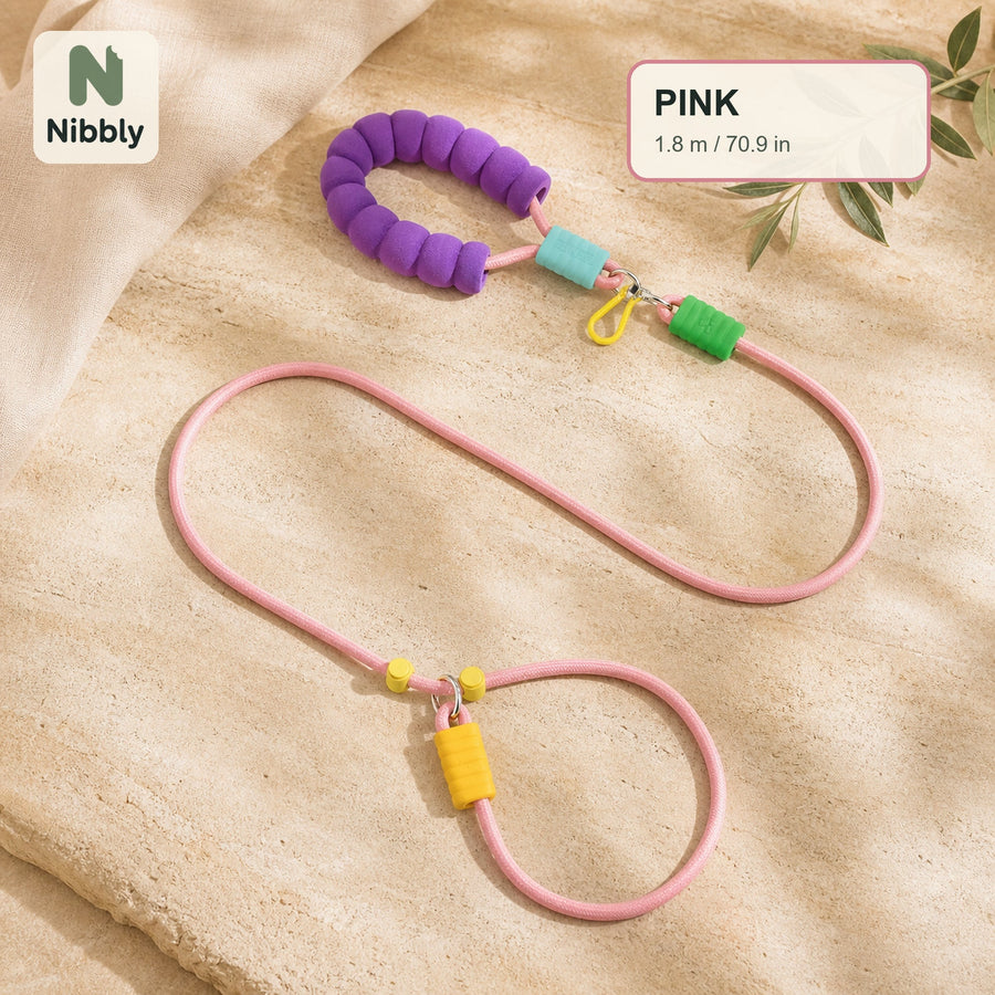 Pink 1.8 m Nibbly PathLoop dog slip lead on warm travertine